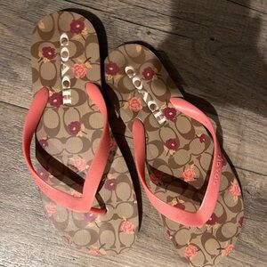 Coach Women's Sandals with Pink Straps and Brown Floral Design